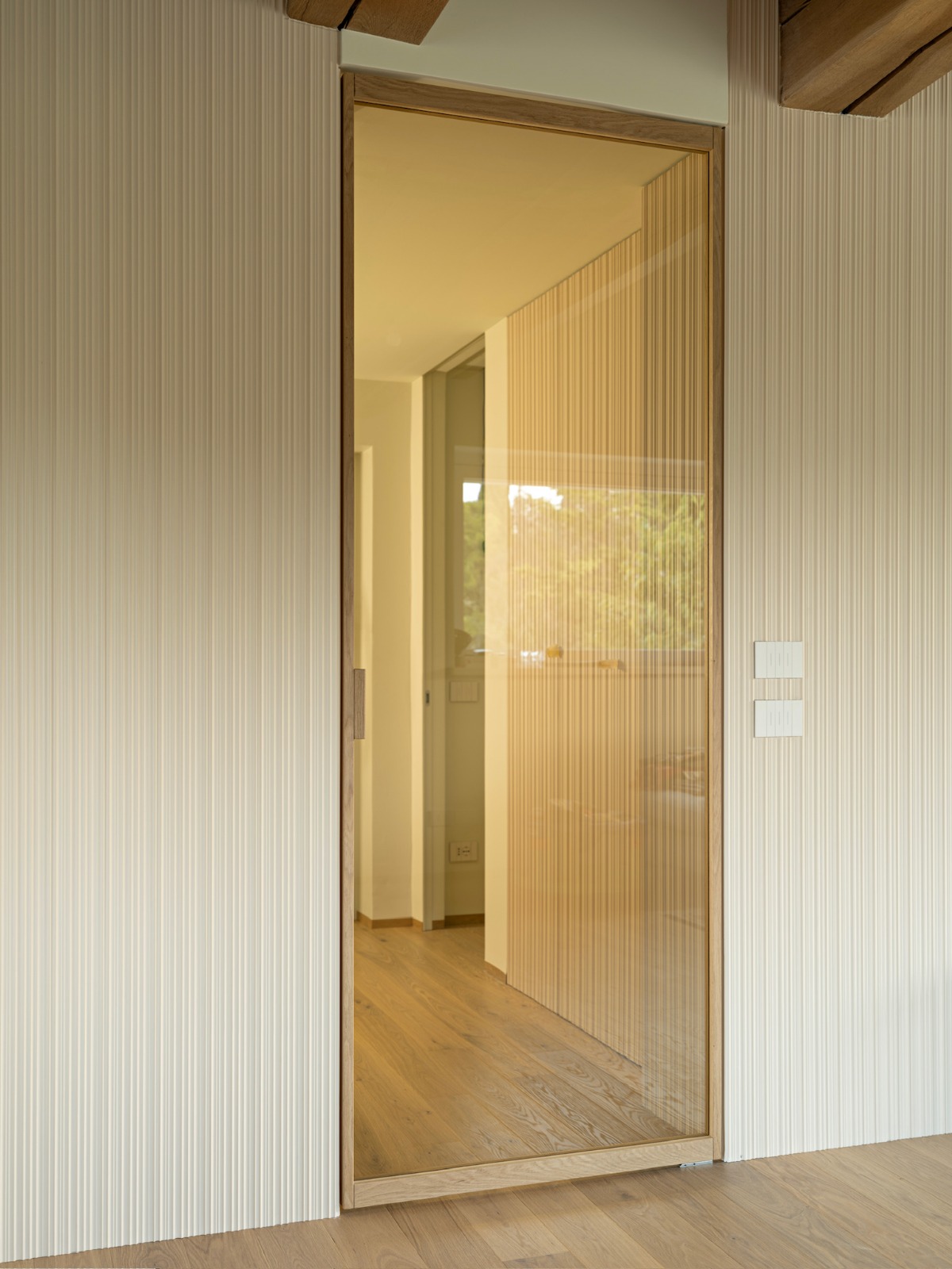 Porta VITRIUM in vetro con cornice sottile